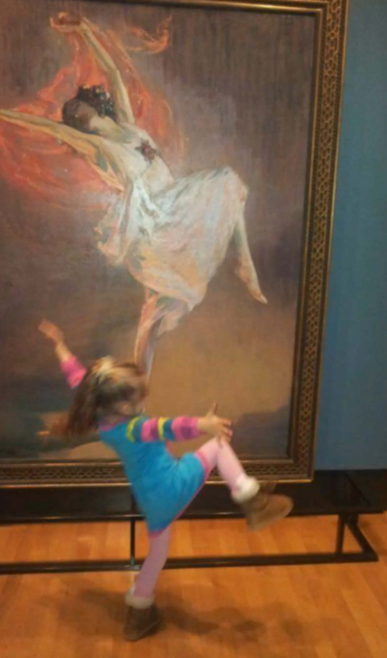 Child dancing imitating painting